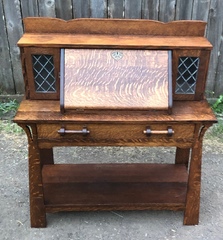 Shop of the Crafter's drop front Desk with leaded glass doors and custom wooden pulls. 